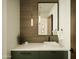 Modern bathroom features a sink, decorative lighting, quartz countertop and green shaker cabinets at 5327 N Invergordon Rd, Paradise Valley, AZ 85253