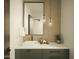Stylish bathroom with a floating vanity, square vessel sink, and modern pendant lighting at 5327 N Invergordon Rd, Paradise Valley, AZ 85253
