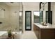 Bright bathroom with glass-enclosed shower, dual vanity, and modern fixtures at 5327 N Invergordon Rd, Paradise Valley, AZ 85253