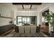 Dining room featuring a modern table, built-in bar, and seamless indoor/outdoor living with pool view at 5327 N Invergordon Rd, Paradise Valley, AZ 85253