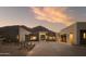 Stunning desert home featuring a stone entryway and mountain views at 5327 N Invergordon Rd, Paradise Valley, AZ 85253