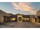 Contemporary desert home with stone accents, neutral colors, and clean lines at 5327 N Invergordon Rd, Paradise Valley, AZ 85253