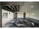 Spacious garage with epoxy flooring and ample room for parking and storage at 5327 N Invergordon Rd, Paradise Valley, AZ 85253