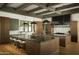 Well-appointed kitchen boasting dual islands and a stunning coffered ceiling at 5327 N Invergordon Rd, Paradise Valley, AZ 85253