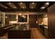 Spacious kitchen featuring stylish hanging lights, and custom wood cabinetry at 5327 N Invergordon Rd, Paradise Valley, AZ 85253