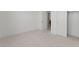 Cozy bedroom featuring carpeting, closet, and neutral walls, ready for personalization at 564 E Aurora Dr, San Tan Valley, AZ 85140