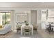 Casual dining area adjacent to kitchen with white table and chairs at 564 E Aurora Dr, San Tan Valley, AZ 85140