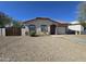 One-story house with stucco exterior, driveway, and small front yard at 6802 N 81St Ln, Glendale, AZ 85303