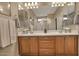 Double vanity bathroom with updated lighting and plenty of counter space at 7850 W Discovery Way, Florence, AZ 85132