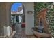 Stone fountain with lush greenery in a courtyard at 7850 W Discovery Way, Florence, AZ 85132