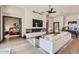 Inviting living room with a modern fireplace, cozy seating, and stylish decor and access to the bedroom at 8141 E Wingspan Way, Scottsdale, AZ 85255