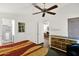 Bedroom with king-size bed and dresser; bathroom and living room views at 8500 E Southern Ave # 577, Mesa, AZ 85209