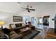 Spacious living room with access to a sunroom and wood-look floors at 8500 E Southern Ave # 577, Mesa, AZ 85209