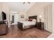 Main bedroom features a ceiling fan, wood floors, and neutral paint at 8909 E Hercules Ct, Sun Lakes, AZ 85248