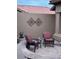 A charming patio with comfortable seating and tasteful decor creates a relaxing outdoor space at 8909 E Hercules Ct, Sun Lakes, AZ 85248