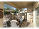 Outdoor patio features a fire pit and comfortable seating at 9041 E Stoney Vista Dr, Sun Lakes, AZ 85248