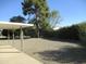 Backyard with gravel landscaping and covered patio at 9827 W Lindgren Ave, Sun City, AZ 85373