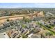 Aerial view showing the property's location in a residential neighborhood with mountain views at 10024 W Montecito Ave, Phoenix, AZ 85037