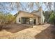 Home's backyard with patio and open space at 10024 W Montecito Ave, Phoenix, AZ 85037