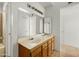 Clean bathroom with double vanity and updated fixtures at 10024 W Montecito Ave, Phoenix, AZ 85037