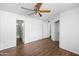 Large bedroom with wood flooring and private bath access at 10024 W Montecito Ave, Phoenix, AZ 85037
