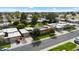 An aerial view showcasing the well-manicured lawn, driveway, and neighborhood setting at 10329 W Manzanita Dr, Sun City, AZ 85373