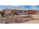 Ranch style home with brick facade and desert landscaping at 11402 N 97Th Dr, Sun City, AZ 85351