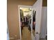 Walk-in closet, fully built out with shelves and storage at 11411 N 91St Ave # 225, Peoria, AZ 85345