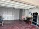 Attached garage with built-in cabinets and storage at 1180 E Marlin Dr, Chandler, AZ 85286