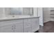 Bathroom with double vanity, white cabinets, and modern fixtures at 1238 S 14Th St, Phoenix, AZ 85034