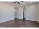 Spacious bedroom with dark floors, closet, and ceiling fan at 1238 S 14Th St, Phoenix, AZ 85034