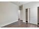 Bedroom with double door closet and dark hardwood floors at 1238 S 14Th St, Phoenix, AZ 85034