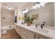 Updated bathroom with double vanity and bathtub at 1326 E Clearwater Ln, Gilbert, AZ 85234