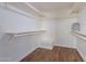 Spacious walk-in closet with ample shelving and hanging space at 1326 E Clearwater Ln, Gilbert, AZ 85234