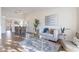 Living room with light gray couch and glass coffee table at 1326 E Clearwater Ln, Gilbert, AZ 85234