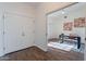 Home office with wood-look floors and built-in shelving at 1326 E Clearwater Ln, Gilbert, AZ 85234