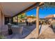 Outdoor patio with seating area and backyard view at 1326 E Clearwater Ln, Gilbert, AZ 85234