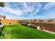 Artificial turf backyard with a water feature and mountain views at 15047 S 178Th Dr, Goodyear, AZ 85338