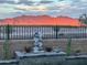 Water feature and mountain views from the backyard at 15047 S 178Th Dr, Goodyear, AZ 85338