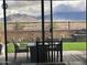 View of backyard and mountain scenery from inside the home at 15047 S 178Th Dr, Goodyear, AZ 85338