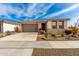 Single-story home with desert landscaping and a two-car garage at 15047 S 178Th Dr, Goodyear, AZ 85338