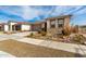 Single-story home with desert landscaping and a two-car garage at 15047 S 178Th Dr, Goodyear, AZ 85338