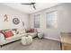 Cozy living room featuring a comfortable sectional sofa and southwestern decor at 15047 S 178Th Dr, Goodyear, AZ 85338