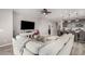 Open living area with a large sectional sofa and tile floors at 15047 S 178Th Dr, Goodyear, AZ 85338