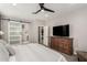Main bedroom features a dresser and sliding barn door at 15047 S 178Th Dr, Goodyear, AZ 85338