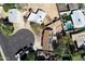 Aerial view of a house with solar panels and a spacious backyard in a residential area at 15201 N 25Th St, Phoenix, AZ 85032