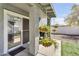 Inviting outdoor patio area with hanging plants, perfect for relaxing or entertaining at 1578 S Sabino Ct, Gilbert, AZ 85296