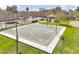 Community basketball court and park area with nearby residential neighborhood on a sunny day at 1578 S Sabino Ct, Gilbert, AZ 85296