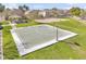 Community basketball court and park area with nearby residential neighborhood on a sunny day at 1578 S Sabino Ct, Gilbert, AZ 85296