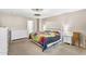 Comfortable bedroom features neutral walls, carpeted floors, and a ceiling fan at 1578 S Sabino Ct, Gilbert, AZ 85296